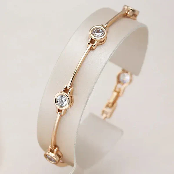 1+1 Offer: Elegant Gold and Crystal Earrings + Elegant bracelet with zirconias in gold - Image 2