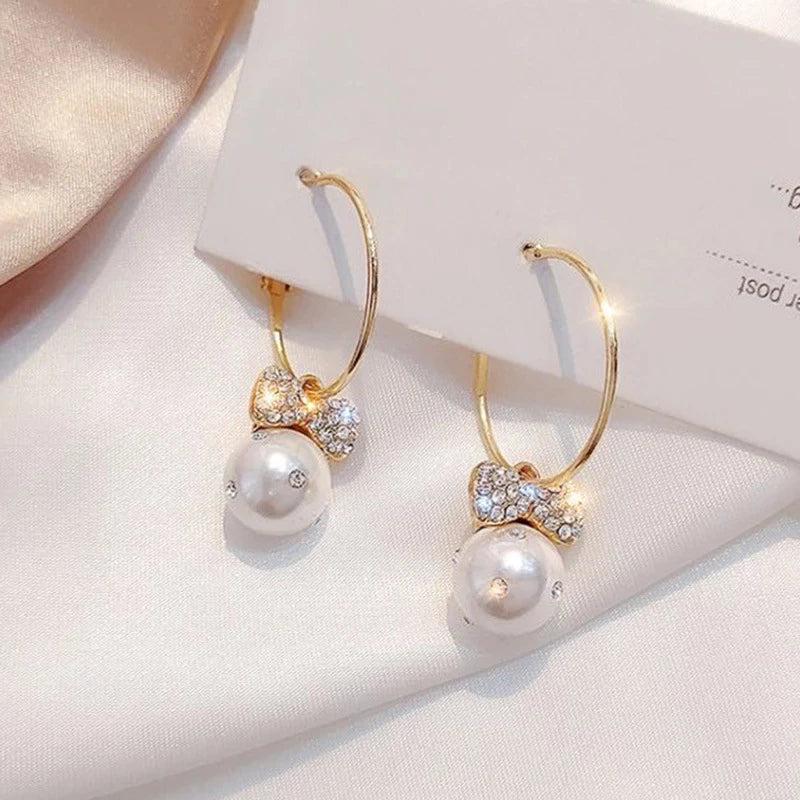 Shiny Gold Earrings with Pearls - Image 2