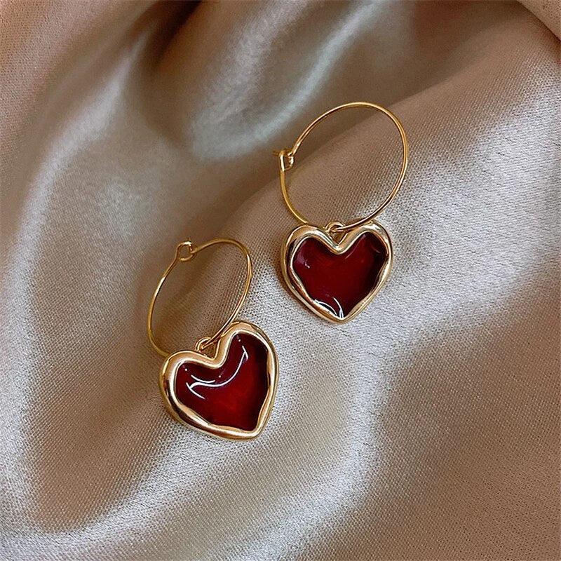 Heart earrings in gold - Image 2