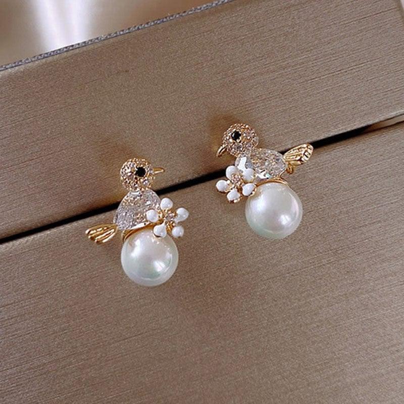Luxurious Birdie Earrings with Cubic Zirconia and Pearl Inlays - Image 2