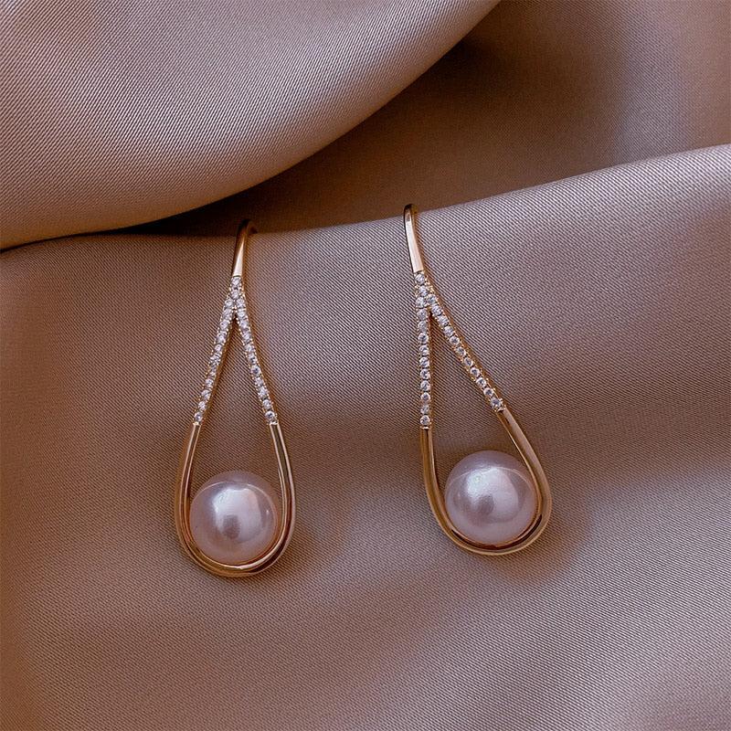 Rose Gold Pearl Earrings - Image 6
