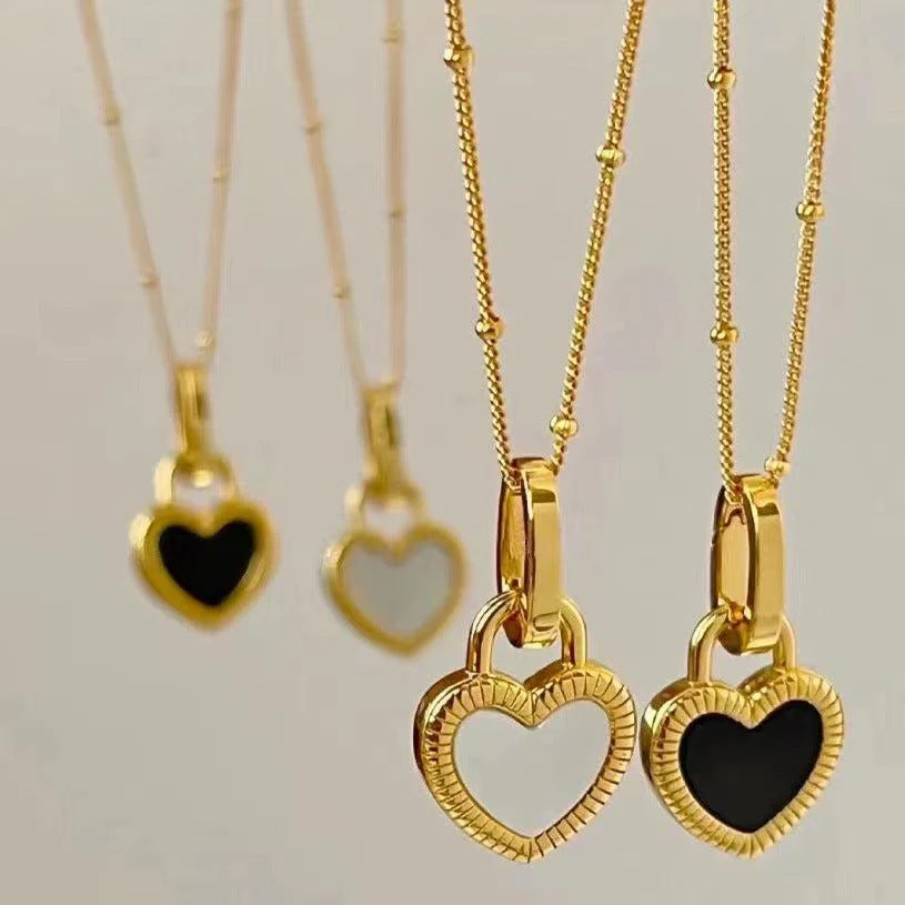 Black and White Heart Necklace in Gold - Image 4