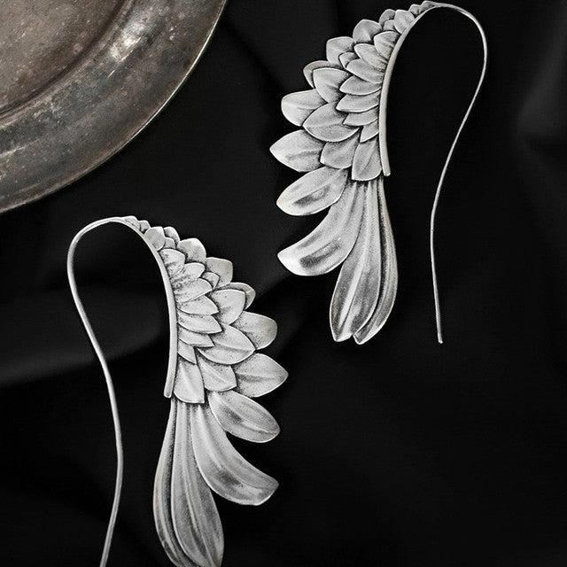 Vintage Winged Earrings in Silver - Image 4